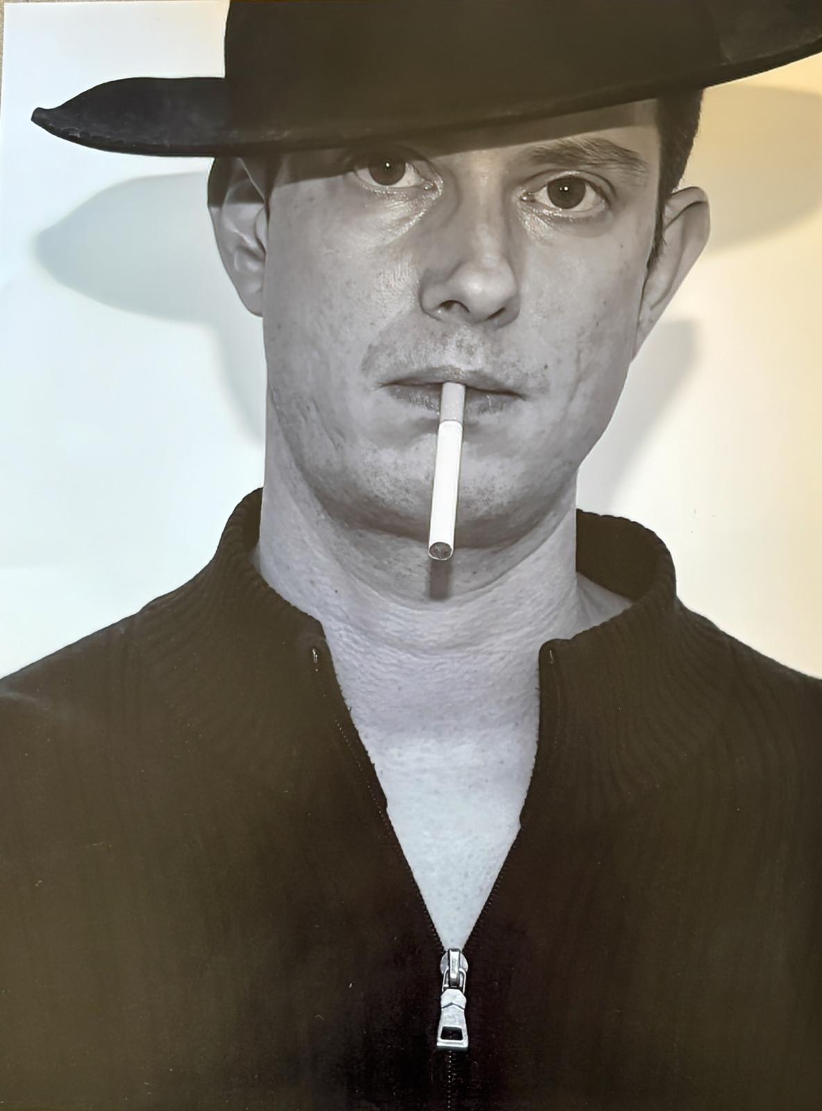 Portrait de Olivier, artiste spécialisé en photographie, peinture et créations artistiques